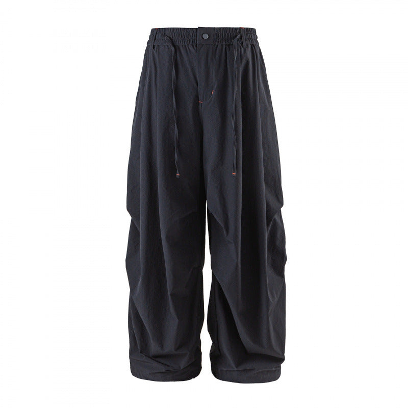 Unisex Weitgeschnittene technische Cargo-Hose mit Gummibund, Kordelzug und Reißverschlusstaschen Echo Archiv