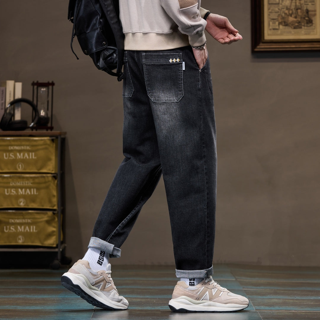 Herren Weite gerade geschnittene Denim-Jeans mit Used‑Wash und Umschlagbund Echoarchiv