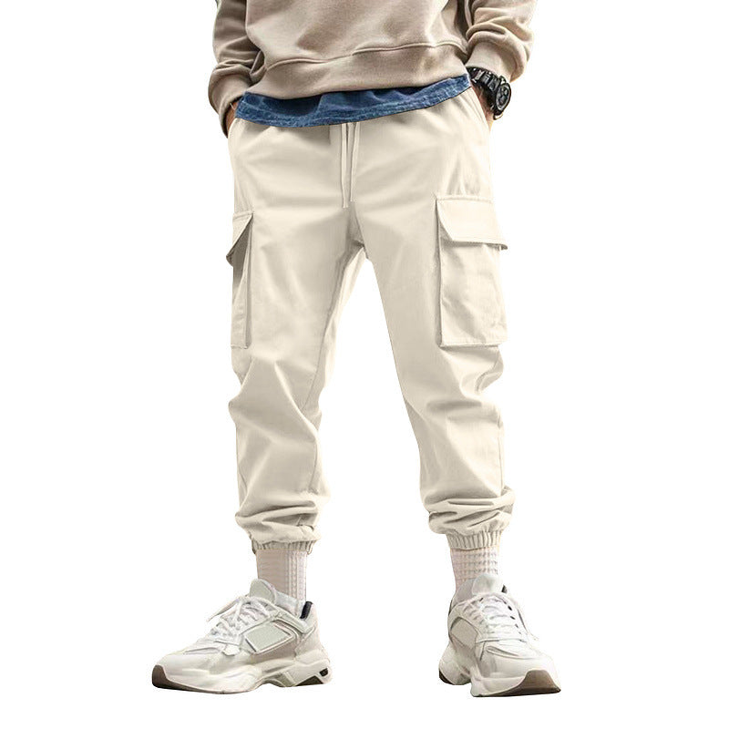 Herren Tapered Cargo-Jogginghose mit Kordelzug, aufgesetzten Klappentaschen und elastischen Bündchen Echoarchiv