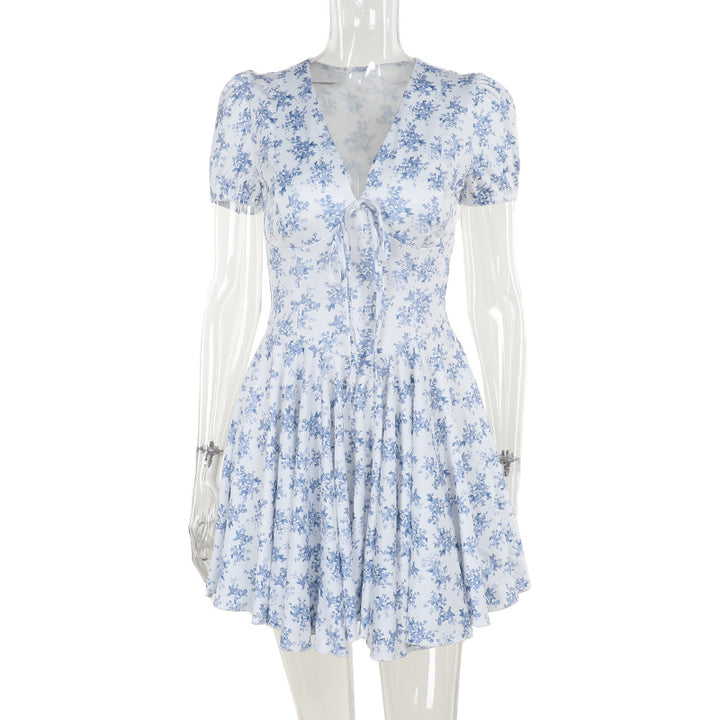 Damen verspieltes Blumenkleid mit voluminösem Rock und taillierter Taille Echo Archiv