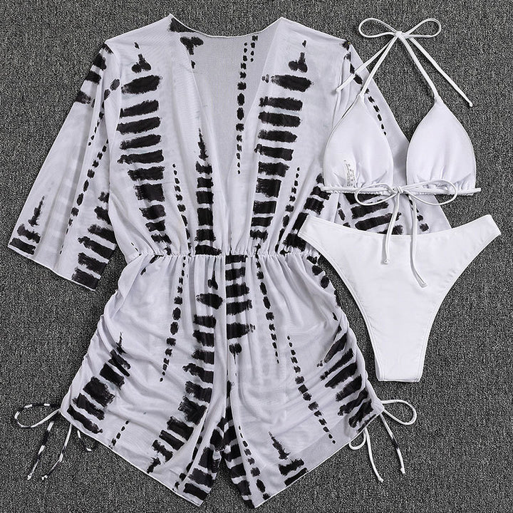 Damen Strandkleid mit tiefem V-Ausschnitt und verstellbaren Rüschendetails Echo Archiv
