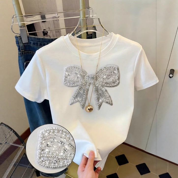 Damen T-Shirt mit glitzerndem Schleifenmotiv und feiner Sticktechnik Echo Archiv