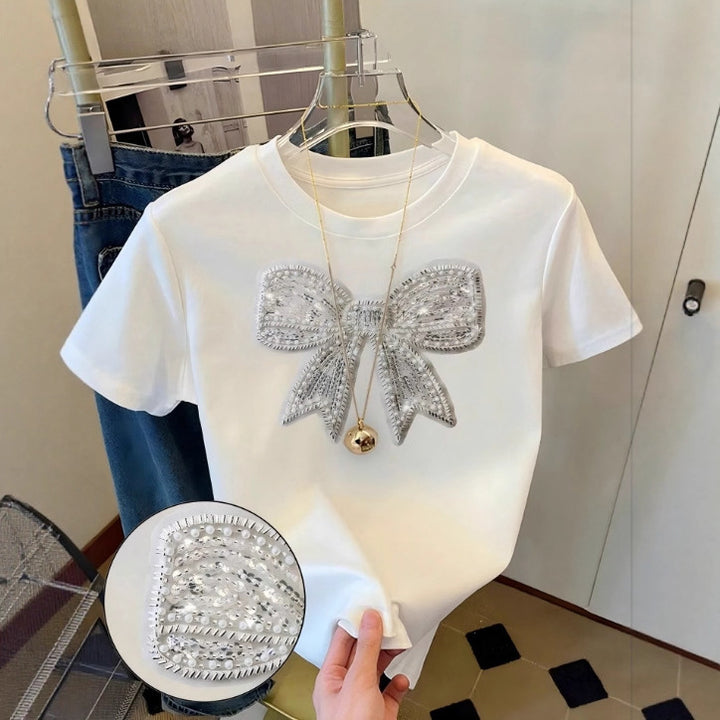 Damen T-Shirt mit glitzerndem Schleifenmotiv und feiner Sticktechnik Echo Archiv