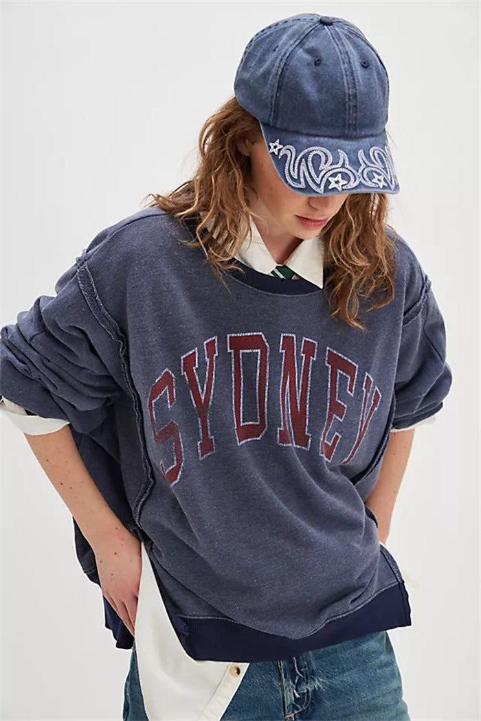Damen oversized Sweatshirt mit Rüben-Print, ausgefransten Nahtakzenten und Daumenlochärmeln – Avérine