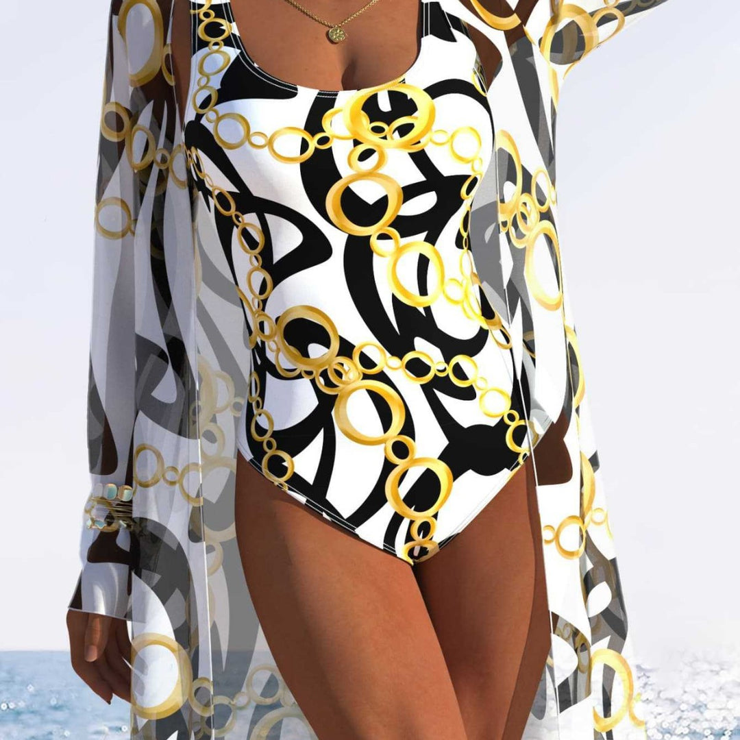 Damen eleganter Einteiler Badeanzug mit transparentem Überwurf und modernem Ringdesign Echo Archiv
