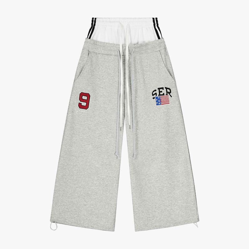 Damen Modische Sweathose mit weitem Schnitt und Sportstreifen Echo Archiv
