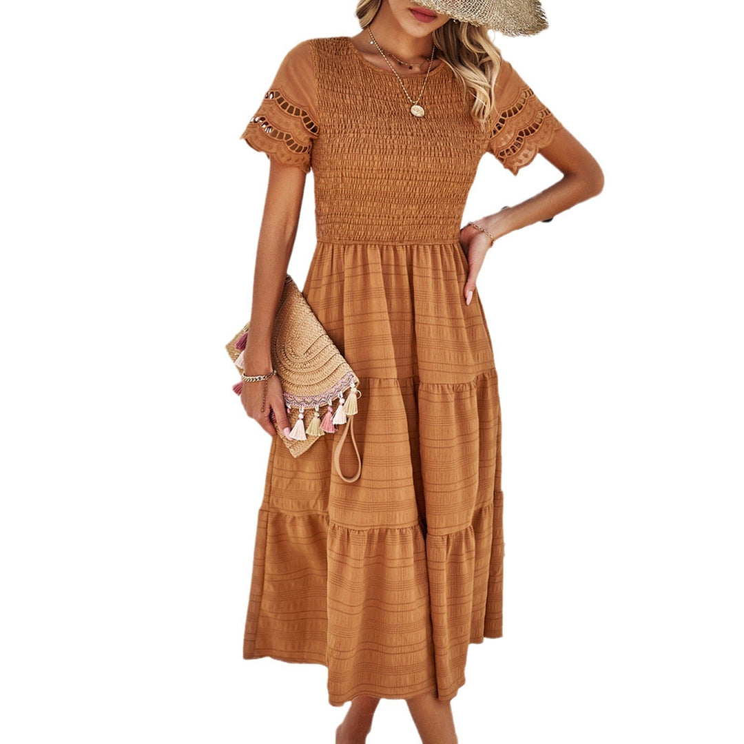 Damen Midikleid mit Puffärmeln und Elastischem Oberteil Echoarchiv