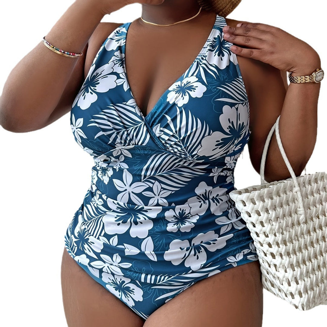 Damen Sportlicher Badeanzug mit floralem Wickeldesign Echo Archiv