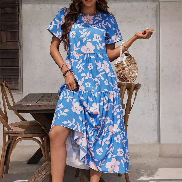Damen nan luftiges Stufenmidikleid mit hoher Taillennaht, kurzem Ärmel und durchgehendem Blumenmuster Echo Archiv