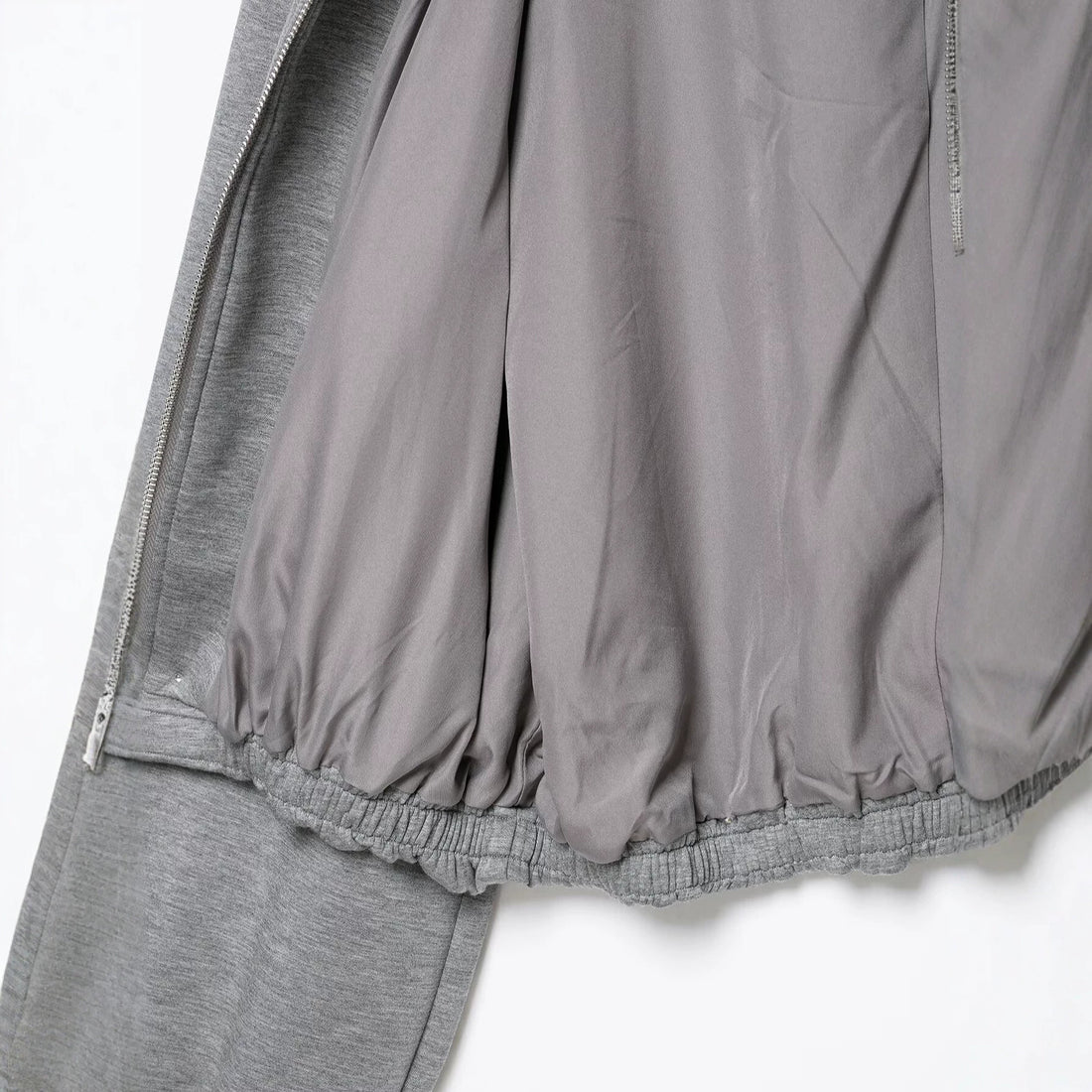 Damen Cropped Kapuzenjacke mit Reißverschluss, Ballonärmeln und elastischem Saum Echoarchiv