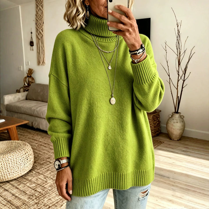 Damen Oversize Rollkragenpullover aus Feinstrick mit gerippten Bündchen und überschnittener Schulter – Mavelle