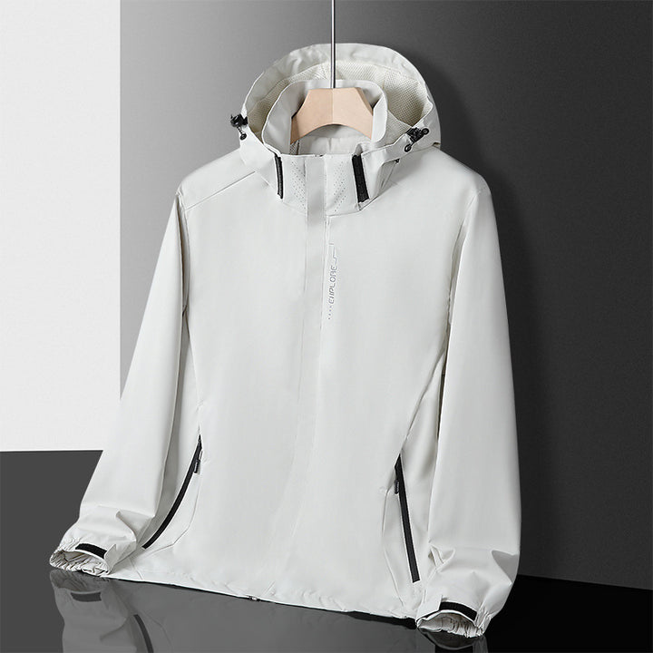 Herren Leichte technische Regenjacke mit Kapuze und dezenter Camouflage‑Textur – Taviero