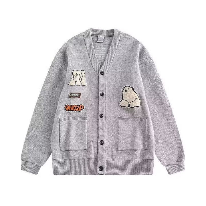 Damen Gemütliche Strickjacke mit bunten Applikationen Echoarchiv