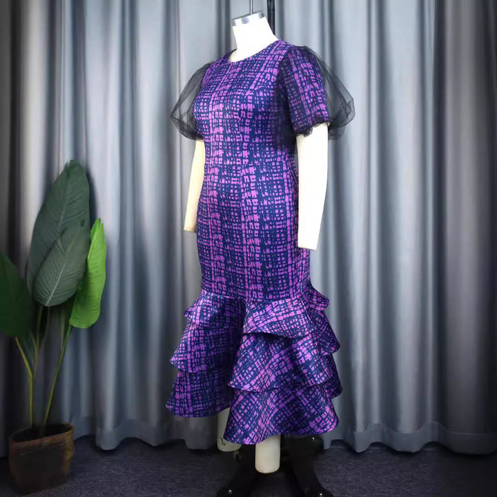 Damen Elegantes Kleid mit voluminösen Tüllärmeln und asymmetrischem Rüschenrock Echo Archiv