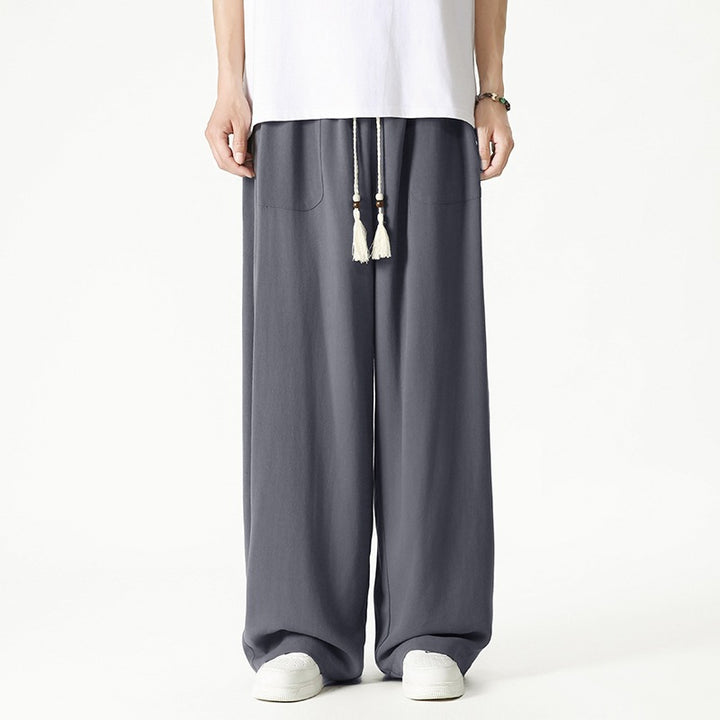 Herren Weit geschnittene Lounge-Hose mit Quasten-Kordel, elastischem Bund und aufgesetzten Taschen Echo Archiv