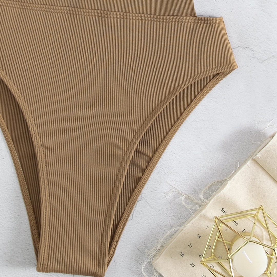 Damen Einteiler Badeanzug mit elegantem Schnitt und seitlichen Riemen Echo Archiv