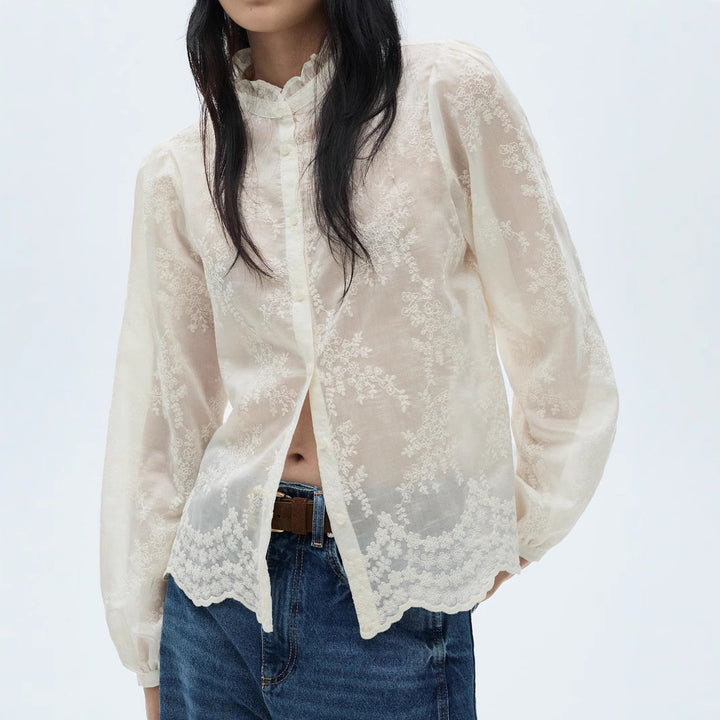 Damen Transparente Stickerei‑Bluse mit Stehkragen, Volumenärmeln und gewelltem Saum – Avérine