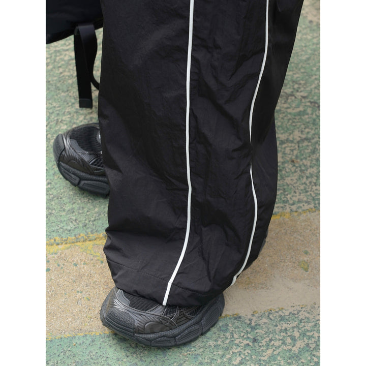 Damen Weite Nylon-Trainingshose mit Kontrastpaspeln und Elastbund Echoarchiv