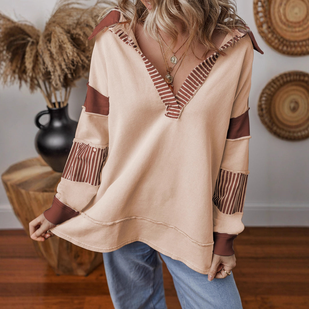 Damen Oversize Sweatshirt mit V-Ausschnitt, gestreiften Ärmelaufsätzen und Kontrastdetails – Mavelle