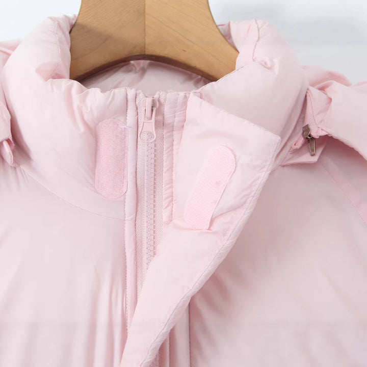 Damen Kurze boxy Funktionsjacke mit Kapuze, wattierter Isolierung und diagonalen Reißverschlusstaschen Echoarchiv