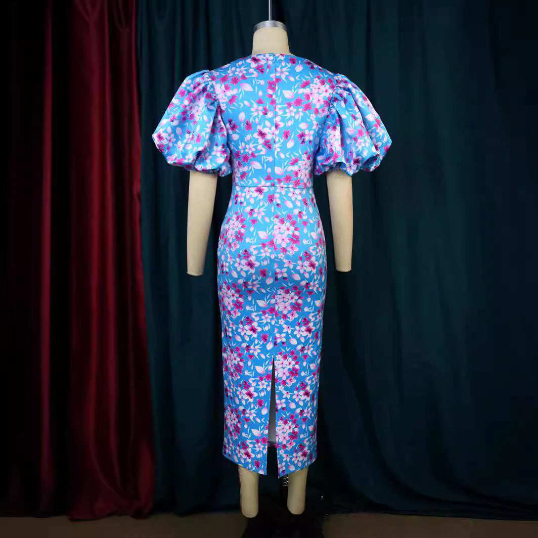 Damen Elegantes Kleid mit voluminösen Puffärmeln und floralem Muster Echo Archiv