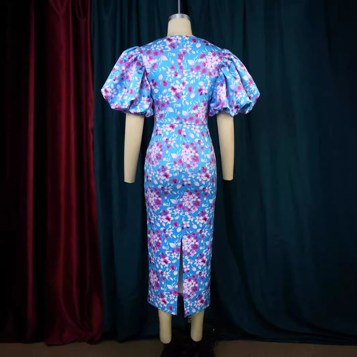 Damen Elegantes Kleid mit voluminösen Puffärmeln und floralem Muster Echo Archiv