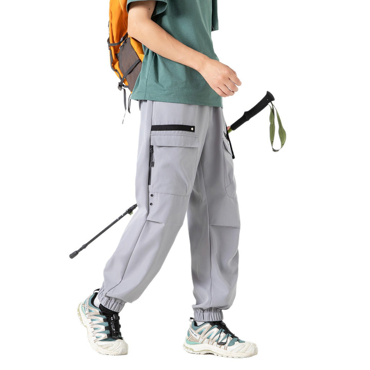 Herren weite Cargo-Jogginghose im Tech‑Utility‑Look mit elastischem Bund und multifunktionalen Klapptaschen Echo Archiv