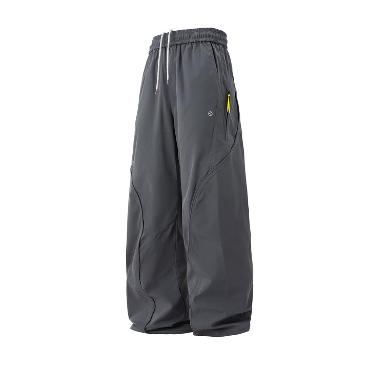 Unisex Weite Nylon-Freizeithose mit Tunnelzug und Reißverschlusstasche Echo Archiv