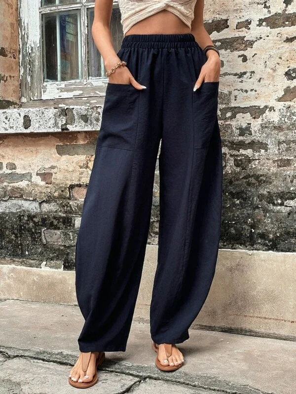 Damen Weite Leinenhose mit elastischem Bund, aufgesetzten Taschen und lässigem Harem-Schnitt Echoarchiv