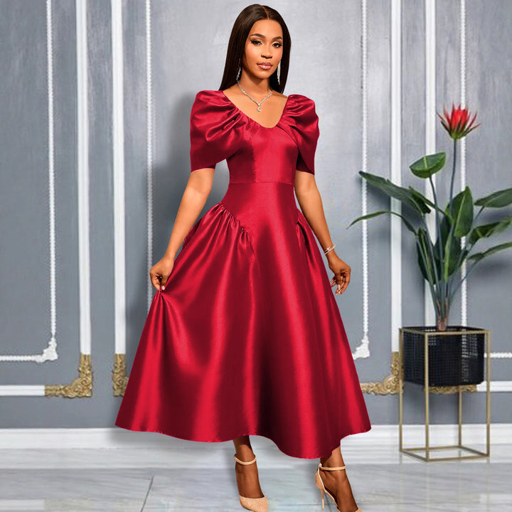 Damen elegantes Midikleid mit voluminösen Puffärmeln und schwingendem Rock Echo Archiv