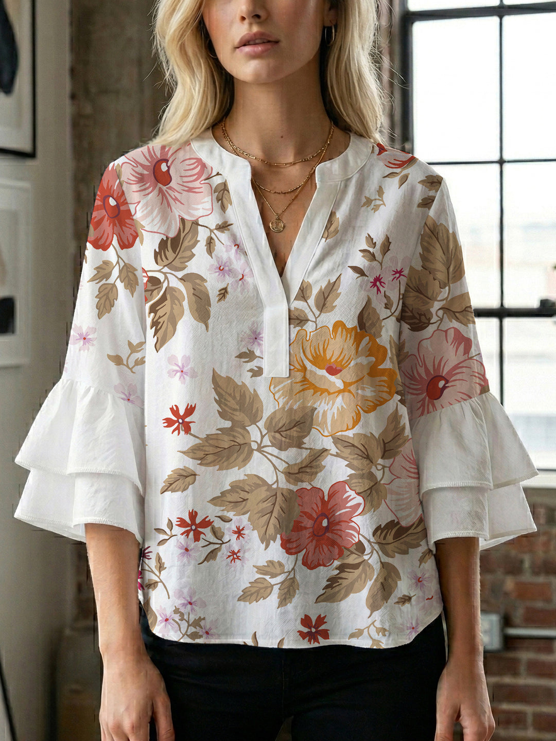 Damen Elegantes Oberteil mit voluminösen Rüchenärmeln und floralem Druck Echo Archiv