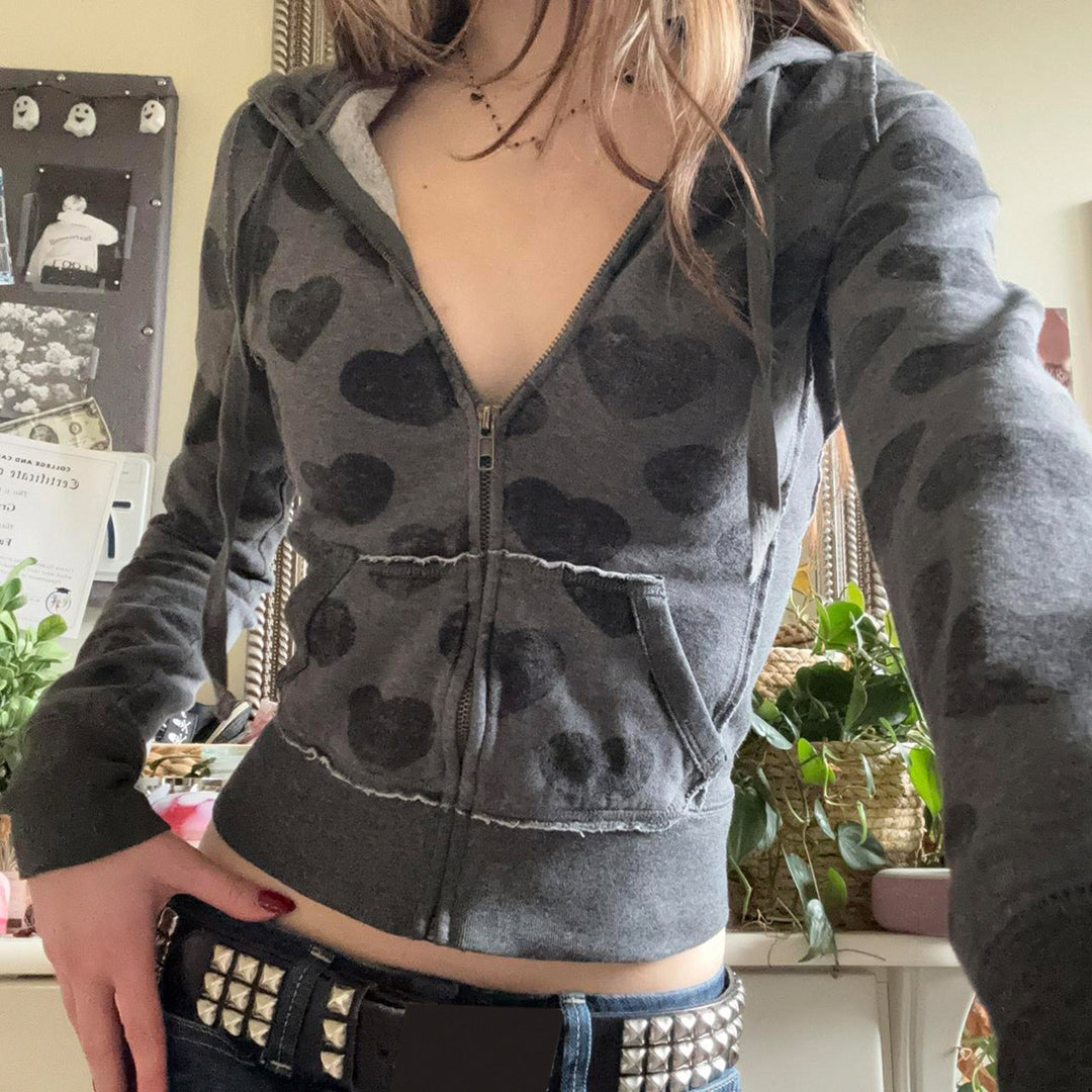 Damen Kurze Kapuzenjacke mit Reißverschluss, Kängurutasche und Allover-Herzmuster – Auréline