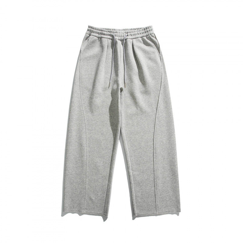 Unisex Weite Baumwoll-Fleece-Jogginghose mit Tunnelzug, Dekorativen Vordernähten und Raw-Saum Echo Archiv