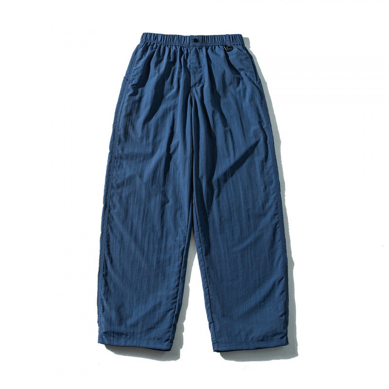 Unisex Weite Crinkle-Hose mit elastischem Tunnelzugbund, tiefem Schritt und Seitentaschen Echo Archiv