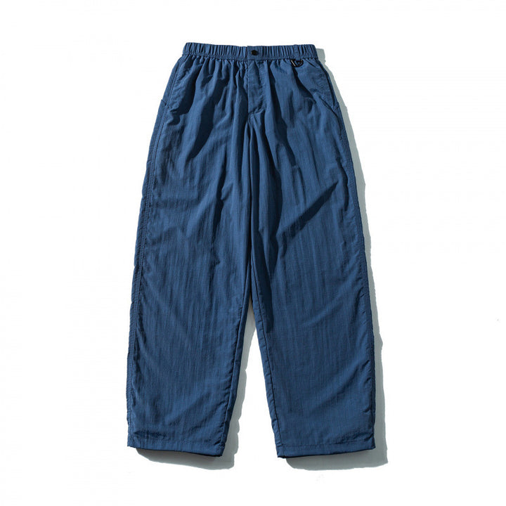 Unisex Weite Crinkle-Hose mit elastischem Tunnelzugbund, tiefem Schritt und Seitentaschen Echo Archiv