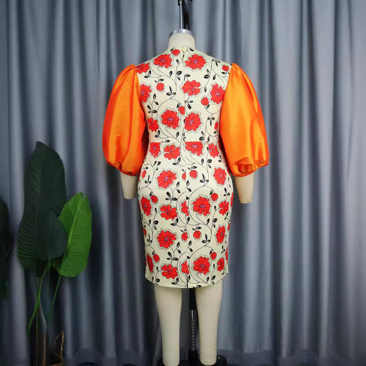 Damen figurbetontes Kleid mit voluminösen Puffärmeln und floralem Design Echo Archiv