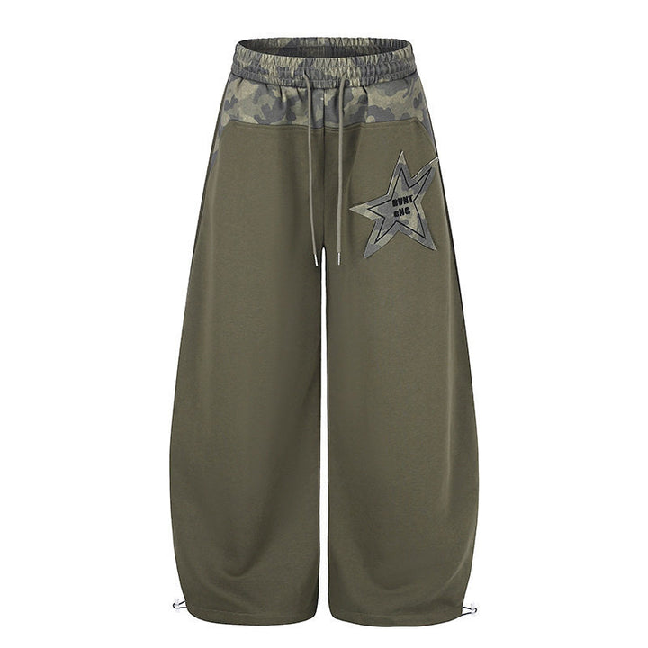 Damen Extraweite Culotte-Sweatpants mit Camouflage-Bund und Sternpatch Echoarchiv