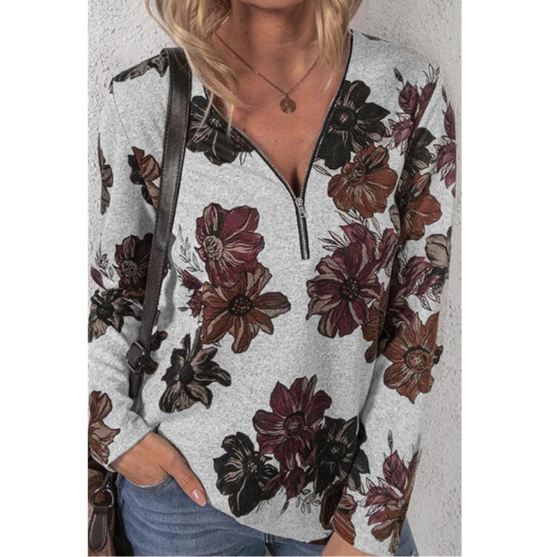 Damen lockeres V-Ausschnitt Longsleeve-Shirt mit kurzem Reißverschluss und floralem Allover-Druck – Orélia