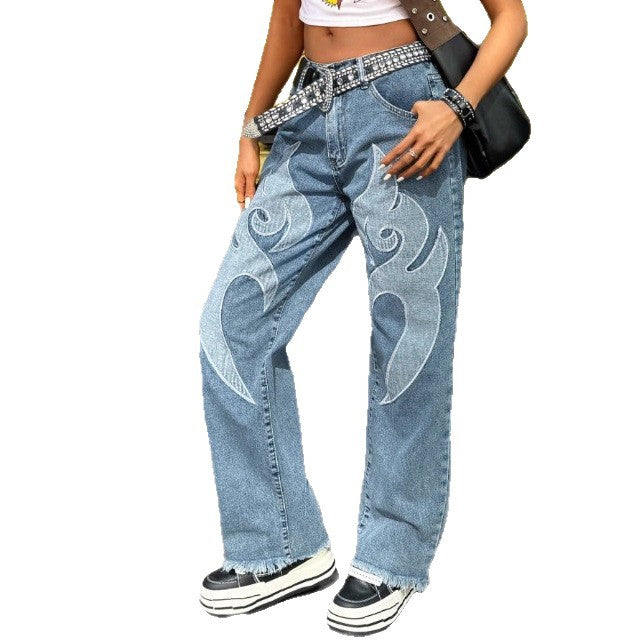 Damen weite Denim-Jeanshose mit Tribal-Applikation, rohem Saum und relaxed Fit Echo Archiv