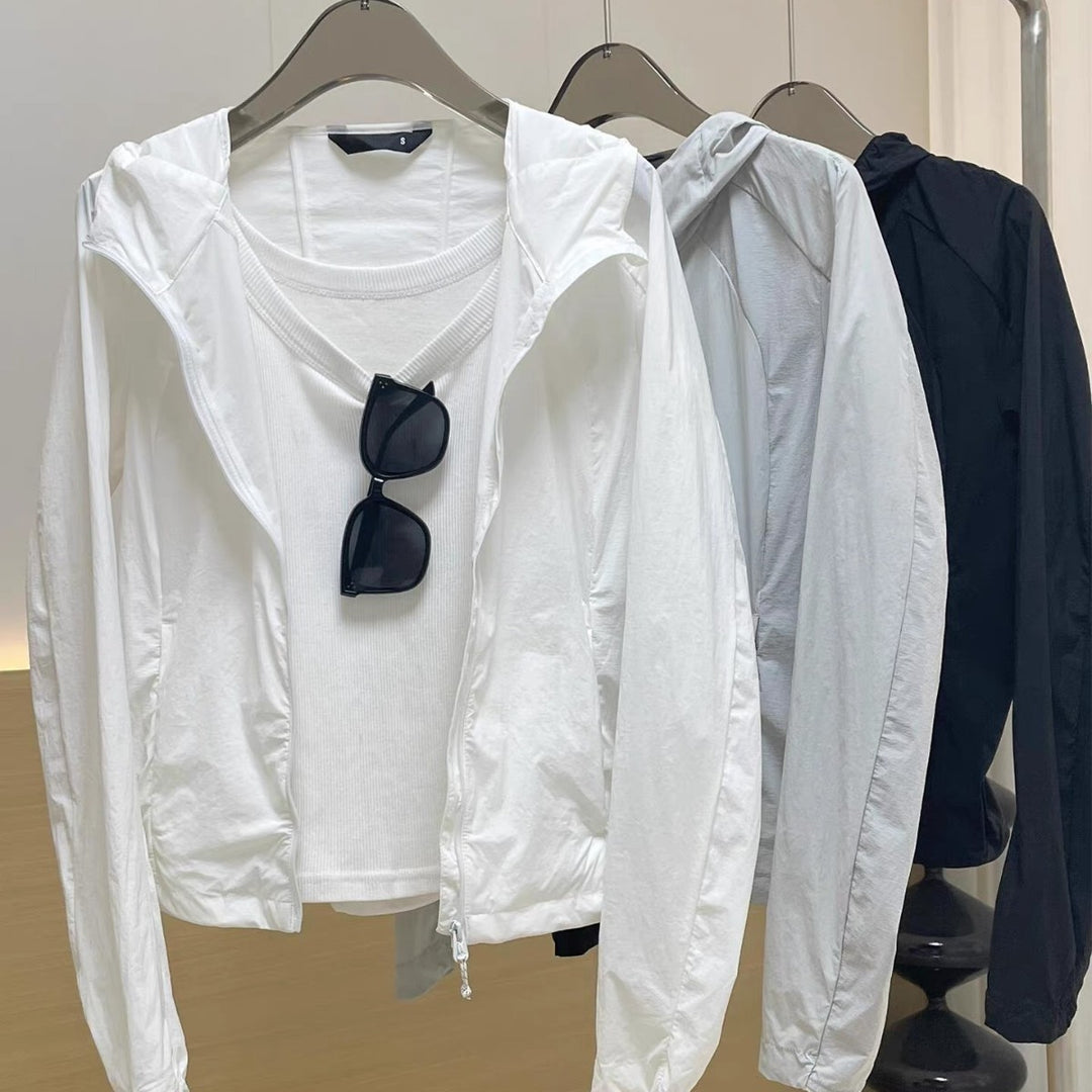 Damen Leichte Kapuzen-Windjacke mit Reißverschluss und verstellbarem Saum Echoarchiv