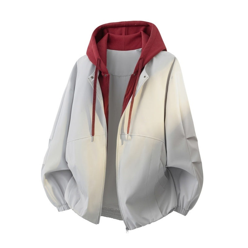 Unisex Oversize-Jacke im Lagenlook mit integrierter Kontrastkapuze und elastischem Saum Echoarchiv