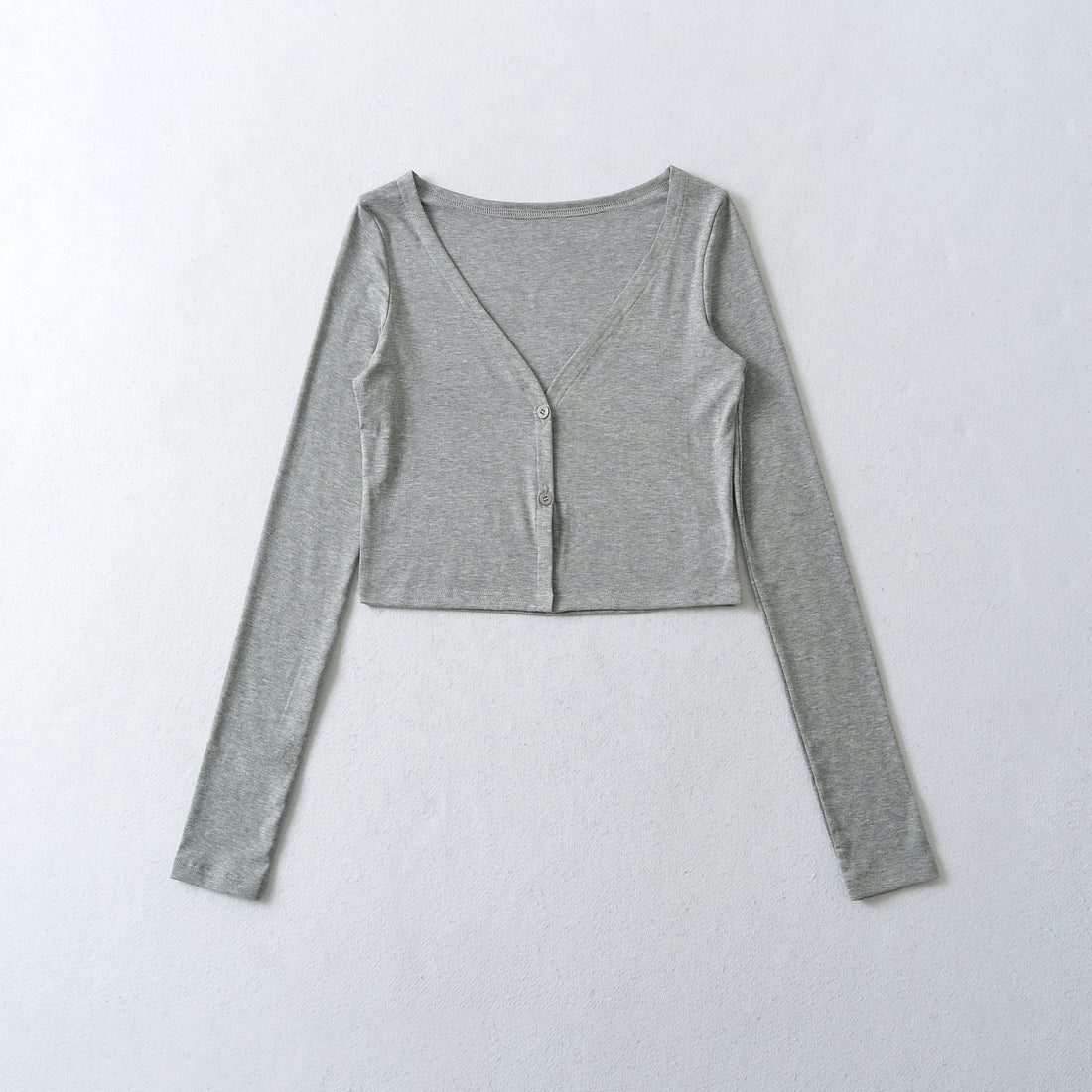 Damen Cropped Jersey-Cardigan mit tiefem V-Ausschnitt und schmaler Knopfleiste Echoarchiv