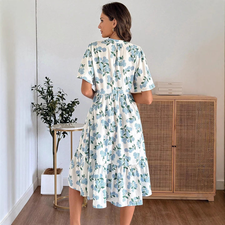 Damen Midikleid mit frischem Blumenmuster und voluminösem Rock Echo Archiv