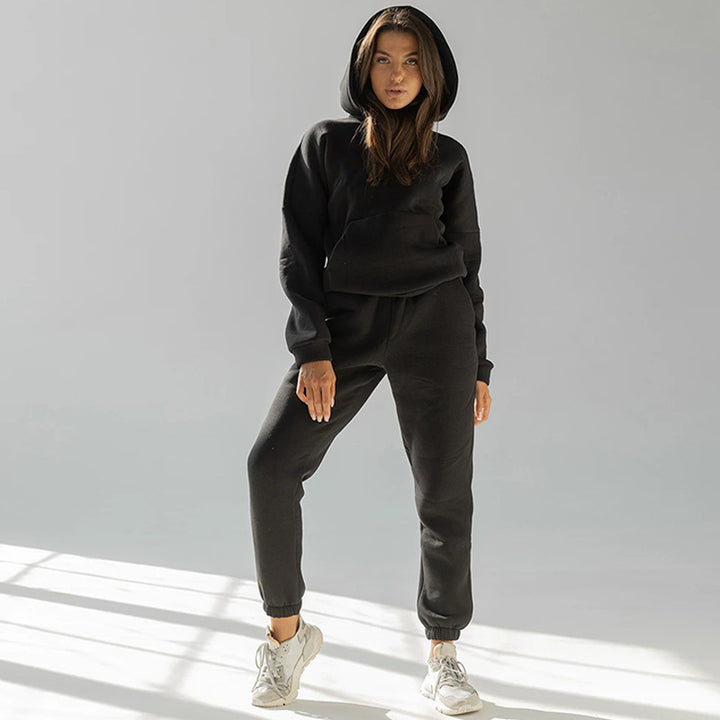 Damen nan zweiteiliges Komfort-Loungewear-Set mit oversized Kapuzenpullover, Kängurutasche und elastischem Knöchel-Jogger aus French Terry Echo Archiv