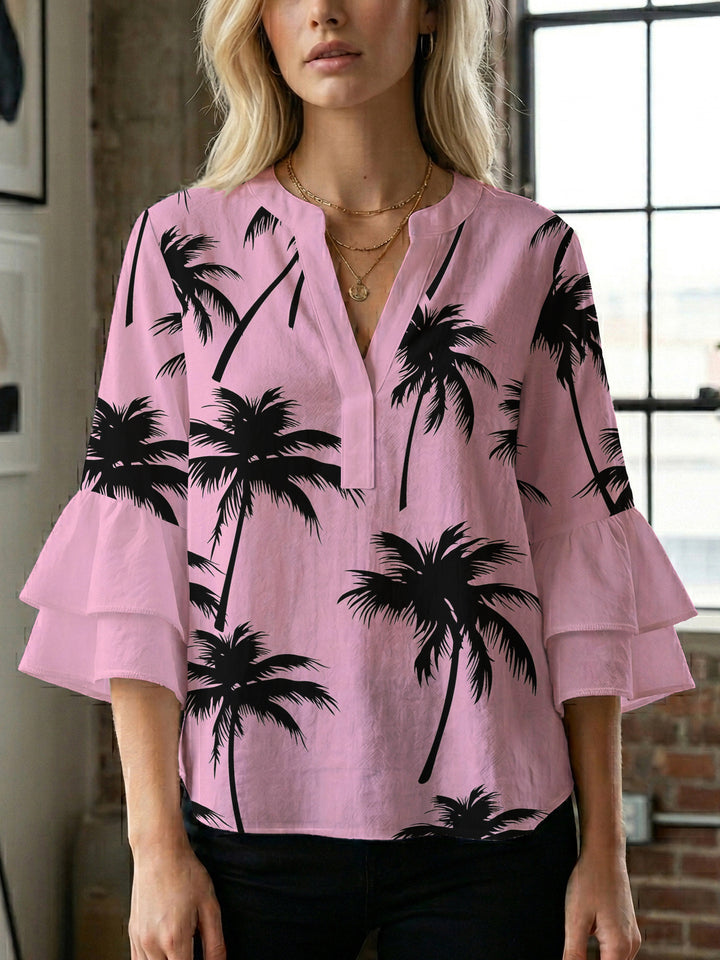 Damen Bluse mit voluminösen Rüschenärmeln und modernem Motiv Echo Archiv