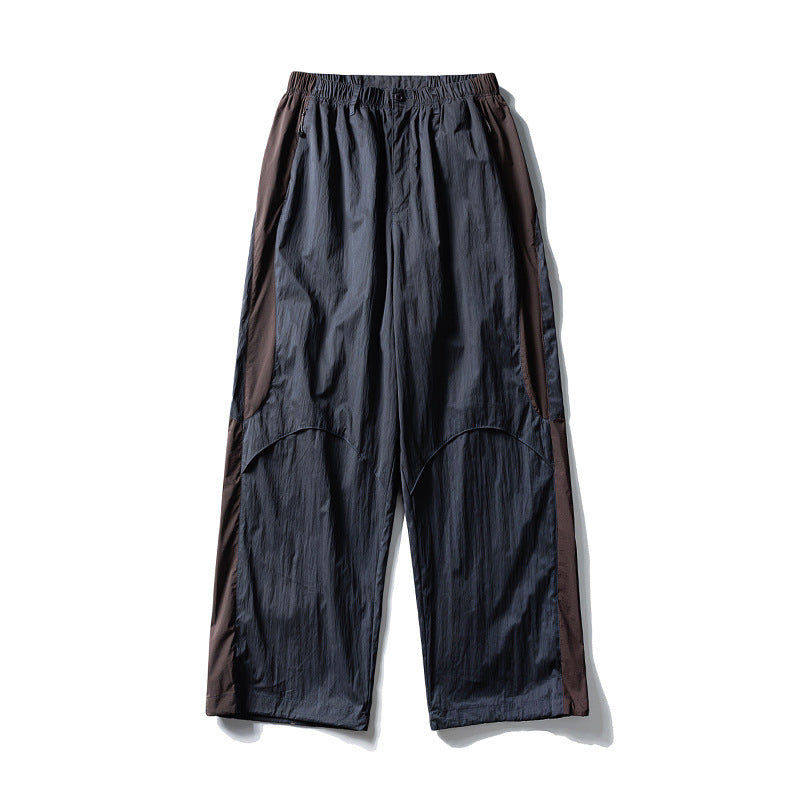 Herren Weite technische Nylon-Cargohose mit elastischem Bund und Paneel-Details Echoarchiv
