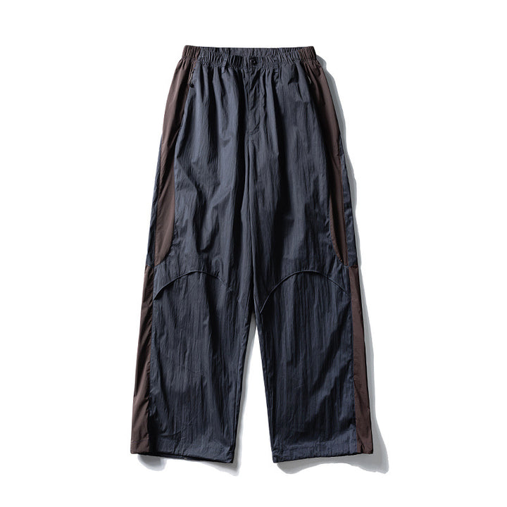 Herren Weite technische Nylon-Cargohose mit elastischem Bund und Paneel-Details Echoarchiv
