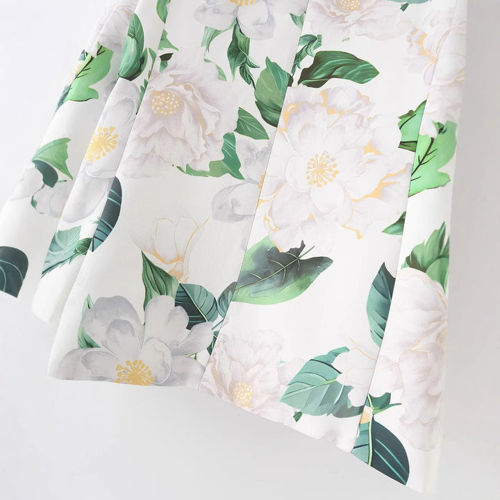Damen floral bedruckter Longblazer mit Reverskragen und Leistentaschen – Célinea