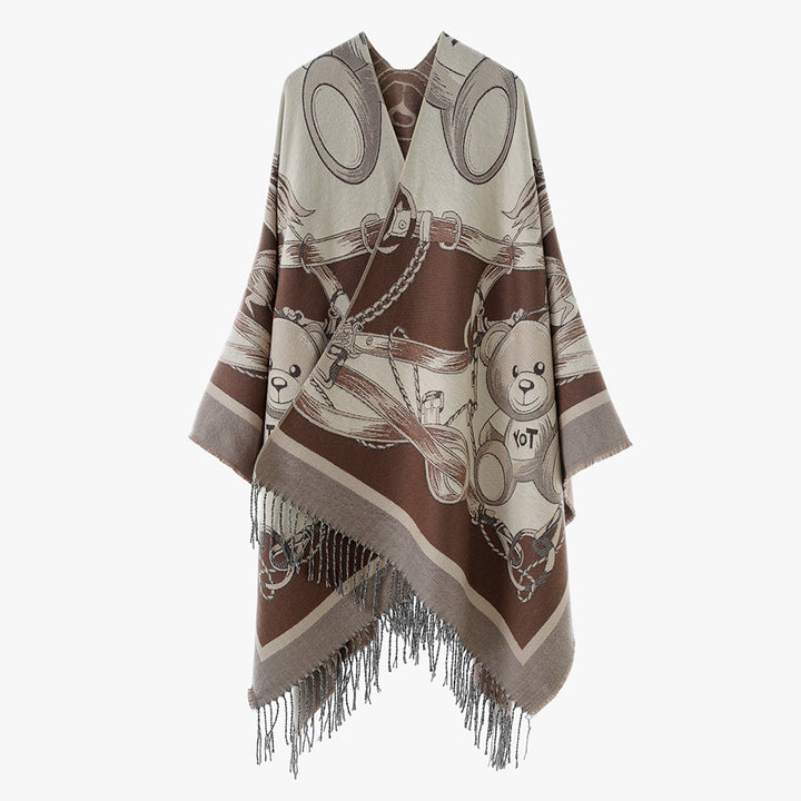 Damen Jacquard-Poncho mit Fransen und illustrativem Teddy-Sattel-Motiv – Avérine