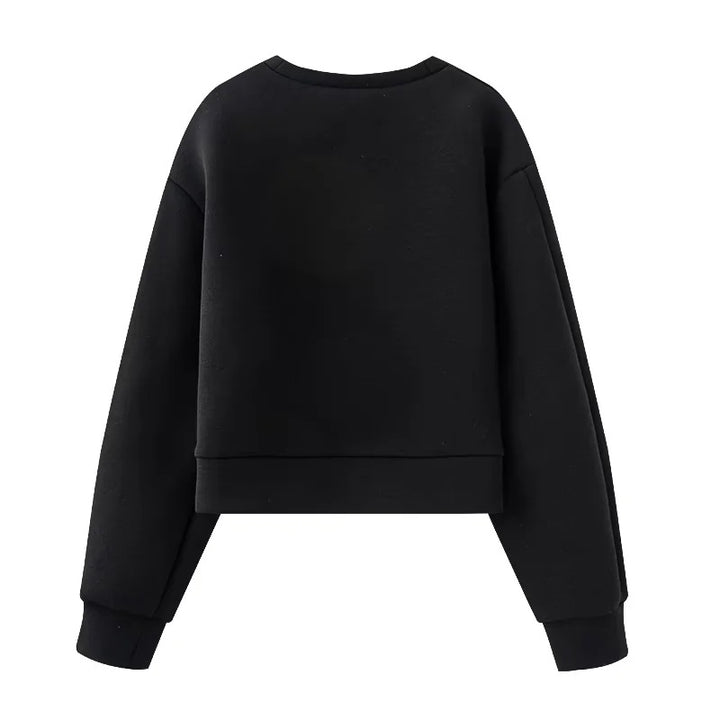Damen kurzes Oversize Sweatshirt mit dekorativen Metallösen an den Ärmeln – Mavelle